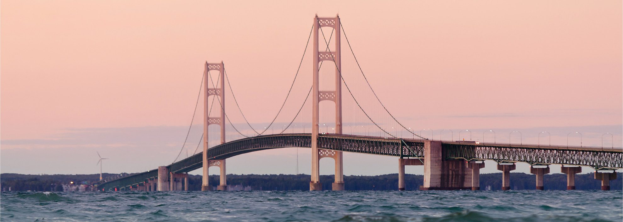 Mackinaw Bridge with pink sunrise sky